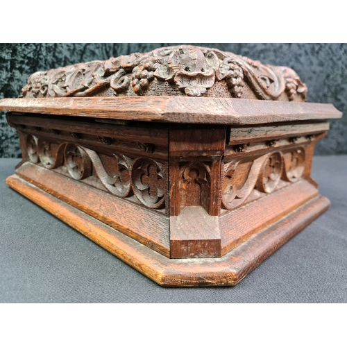 73 - Beautifully carved oak wooden storage / jewellery box with mirror fitted inside lid, measures approx... 