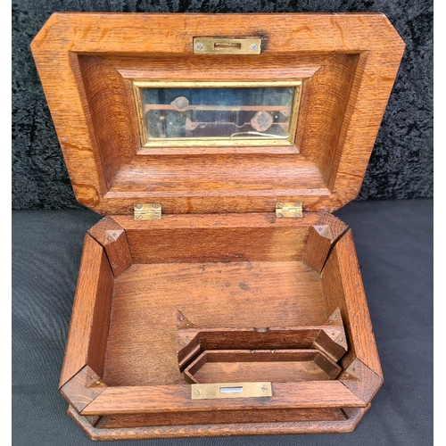 73 - Beautifully carved oak wooden storage / jewellery box with mirror fitted inside lid, measures approx... 