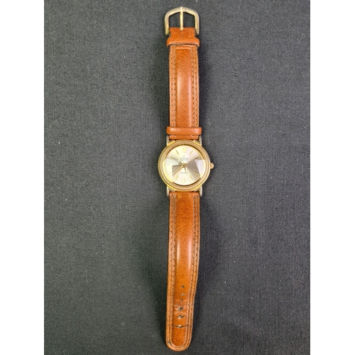 740 - Stylish Omega Geneve Quartz Watch with leather strap. Working order.