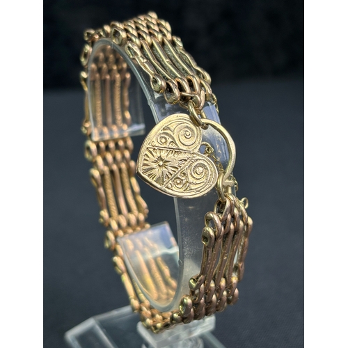 757 - Absolutely fabulous 9ct gold articulated bracelet with padlock and safety chain.19.8 gms.