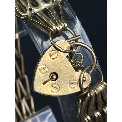 758 - Very pretty 9ct gold articulated bracelet with padlock and safety chain. 21.9 gms.