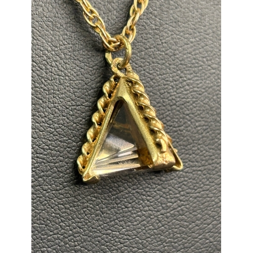 763 - Gorgeous 9ct gold chain and pendant with smoky quartz crystal in the form of a pyramid. Chain 64 cms... 