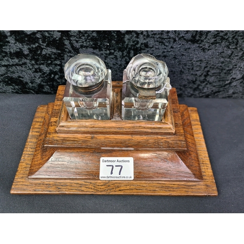 77 - Oak stand with two glass inkwells