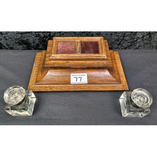 77 - Oak stand with two glass inkwells