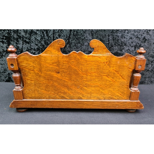 79 - Wooden desk stand with intricately carved back and fitted ceramic dish and inkwells