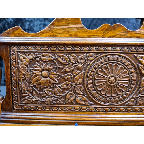 79 - Wooden desk stand with intricately carved back and fitted ceramic dish and inkwells