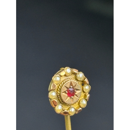 795 - Pretty tie stick pin with 8 seed pearls and a red stone (garnet)?