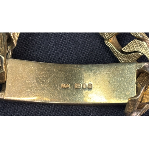 839 - Heavy and chunky hallmarked silver gilt identity bracelet with vacant cartouche. 90gms.