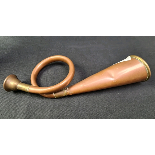 86 - One long and one small curled copper and brass hunting horns