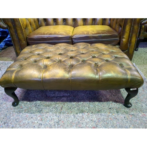 911 - 2 seater leather chesterfield sofa with matching footstool.  W154cmx D90cm