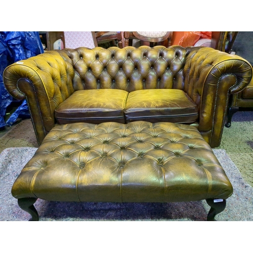 911 - 2 seater leather chesterfield sofa with matching footstool.  W154cmx D90cm