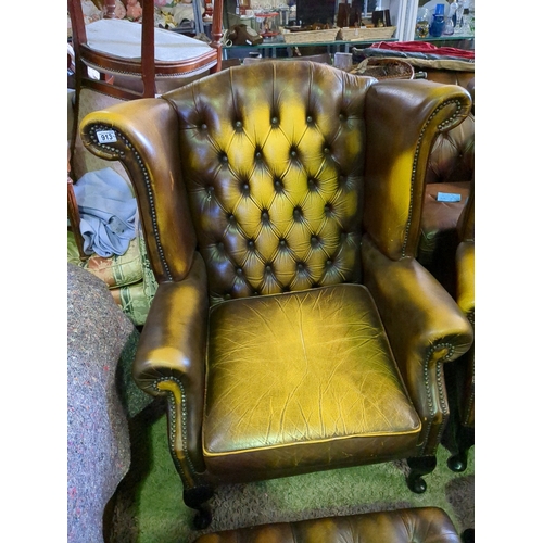 913 - Pair of classic wingback Chesterfield chairs with matching footstools.  W90cm x D90cm.