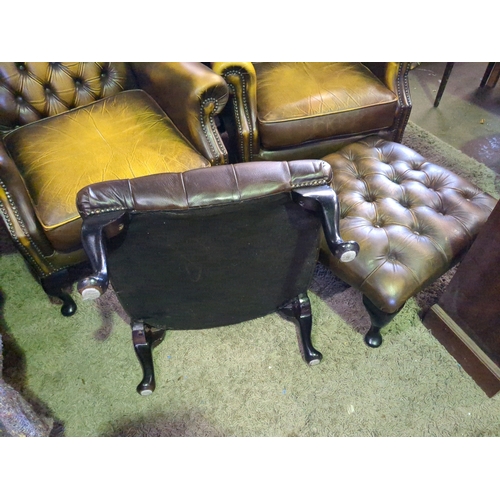 913 - Pair of classic wingback Chesterfield chairs with matching footstools.  W90cm x D90cm.