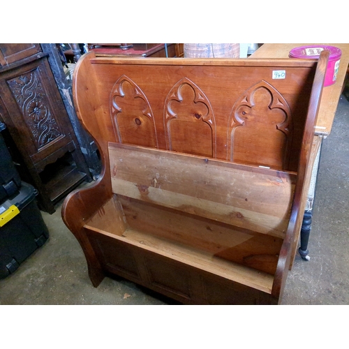 940 - Small pine winged settle with lidded seat (storage under) and exquisite gothic arch detailing to the... 