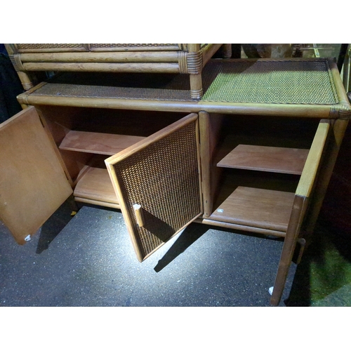 972 - A pair of wicker storage cupboards to match earlier lots.  Smallest H60CM x W72CM x D42CM.  Largest ... 