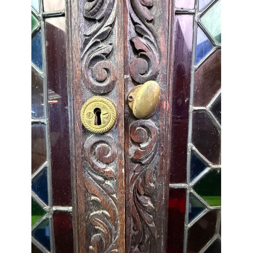 458A - Unusual pair of stained glass doors, with carved surround, from a ship's medicine cabinet.. Matching... 