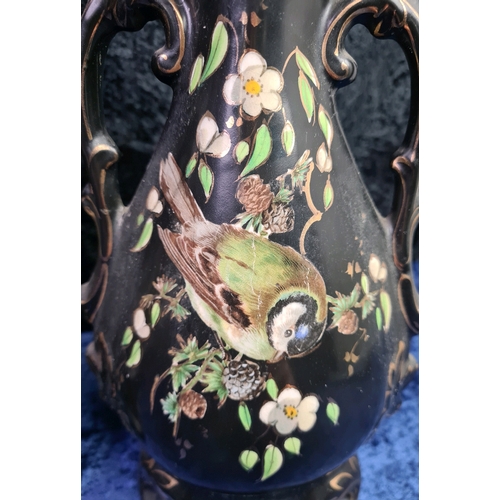 17 - Porcelain black painted mantle clock with Robin bird design with two English made complementary vase... 