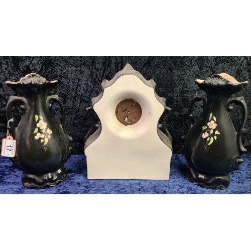 17 - Porcelain black painted mantle clock with Robin bird design with two English made complementary vase... 