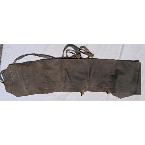 123 - WW2 D-Day green covered Dunlop life ring / life vest, missing nozzle