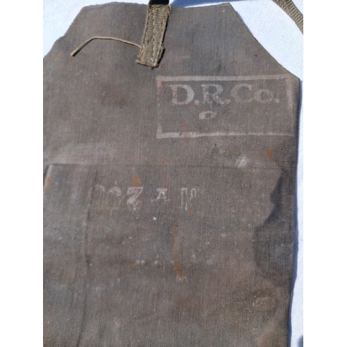 123 - WW2 D-Day green covered Dunlop life ring / life vest, missing nozzle