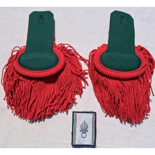 131 - French legion shoulder boards and a cloth badge