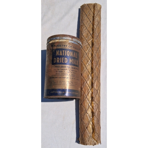 132 - WW2 Dried milk tin and celluloid and string window application to prevent glass spray from blasts.