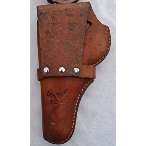 154 - Five leather holsters, 2 of them by Hunter, one shoulder holster
