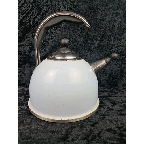 282 - A baby blue Aga branded hob top kettle.