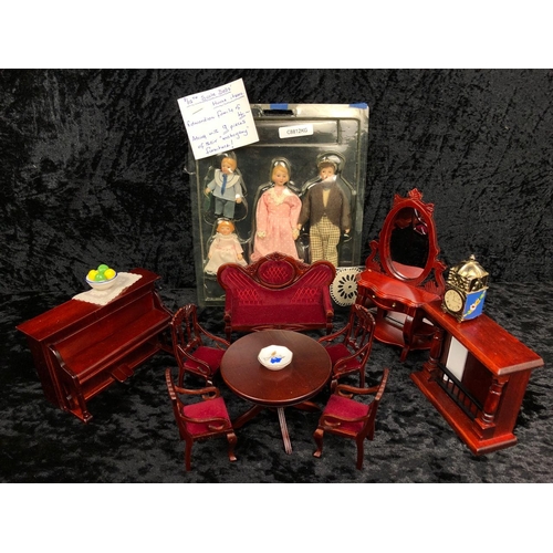 107 - Starter kit for a Victorian doll’s house including a family of figures, mahogany furniture and acces... 
