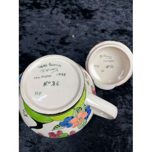 168 - Three Art Deco-inspired handmade and colourfully painted ceramics by J Vicary plus a vintage preserv... 