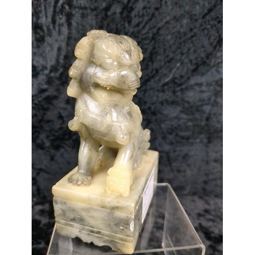 258A - Hand carved jade figurine of a foo dog. Approx H13cm.