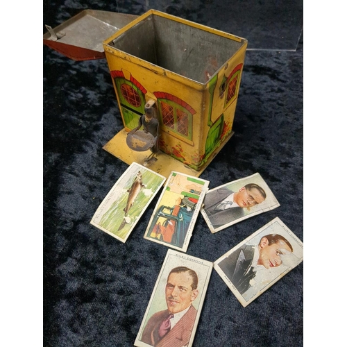 322 - Set of three three Cherished Teddies figurines, a vintage tin, and others…