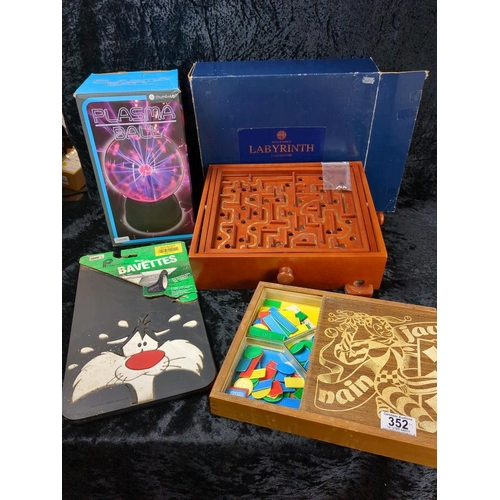 352 - Collection of assorted games and a boxed plasma ball!