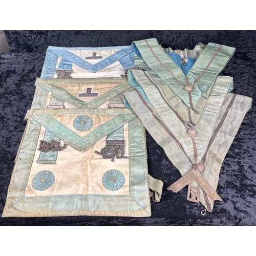 398 - Collection of vintage leather and silk Masonic aprons and collars.