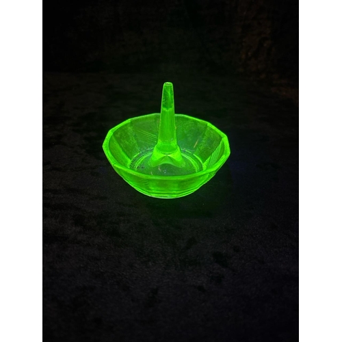 423 - Dressing table set of four uranium green glass items, plus an embossed glass plaque.