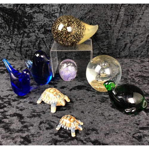 442 - Collection of unusual glass paperweights and two vintage Wade tortoises.