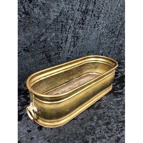 452 - 1970s handmade copper artisan planter (approx H10 x W39cm) and a smaller Indian brass planter.