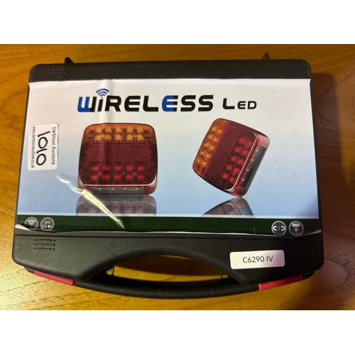 1010 - Cased wireless LED work lamps.