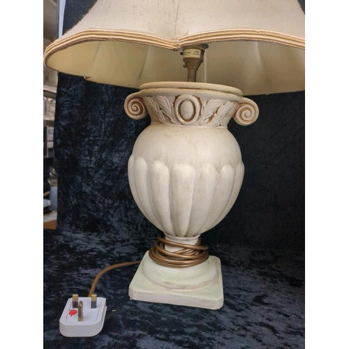 129 - Large green ceramic lamp base with matching shade along with a cream urn style lamp base and shade.