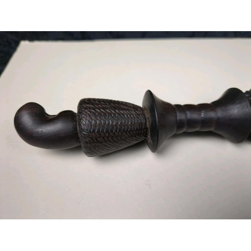 261 - Interesting hand carved tribal staff or weapon! Approx L40cm.