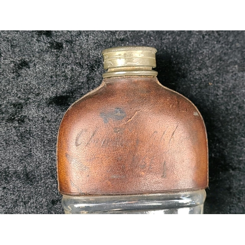 510 - Antique glass and leather hip flask, approx H11cm.