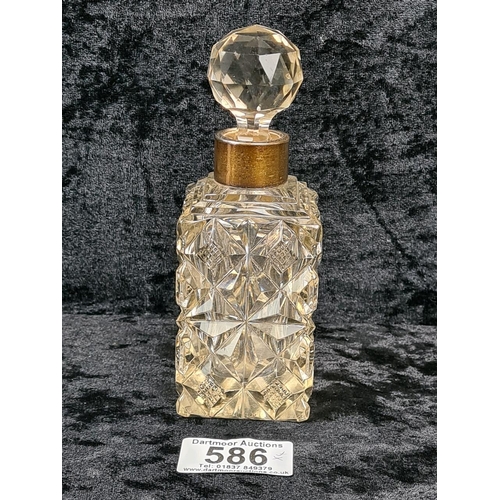 586 - Silver lidded glass dressing table pin dish (Birmingham 1903), silver collared perfume bottle (rubbe... 