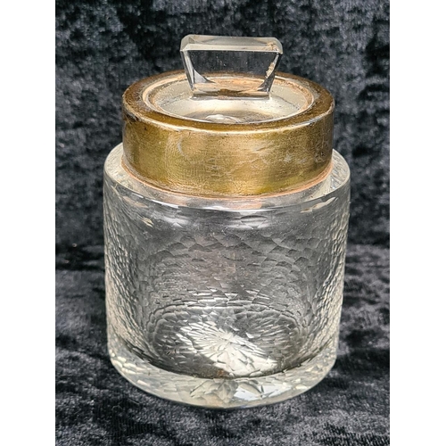 586 - Silver lidded glass dressing table pin dish (Birmingham 1903), silver collared perfume bottle (rubbe... 