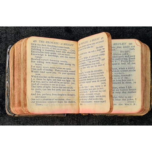 605 - Tennyson’s Poetical Works miniature book with silver front cover bearing portrait of Tennyson. Indis... 