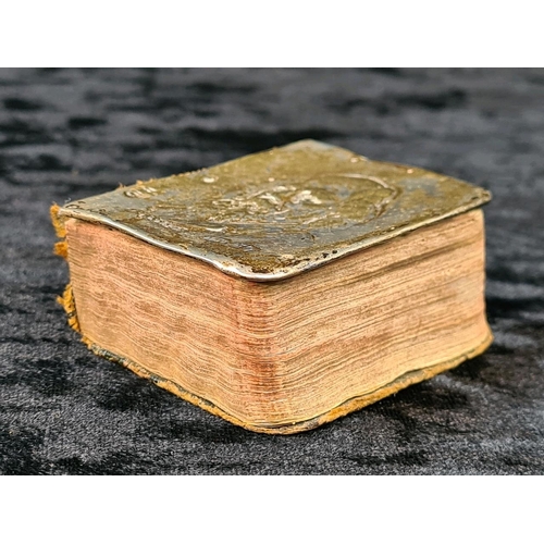 605 - Tennyson’s Poetical Works miniature book with silver front cover bearing portrait of Tennyson. Indis... 