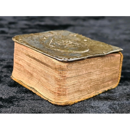 605 - Tennyson’s Poetical Works miniature book with silver front cover bearing portrait of Tennyson. Indis... 