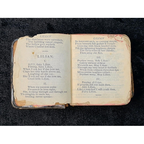 605 - Tennyson’s Poetical Works miniature book with silver front cover bearing portrait of Tennyson. Indis... 