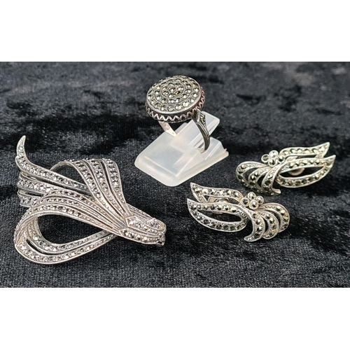 635 - Lovely set of silver marcasite jewellery including a swirly design brooch (925 hallmarked), circular... 