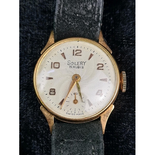 648 - Solery 18ct gold ladies wrist watch on leather strap in working order, approx 11g total