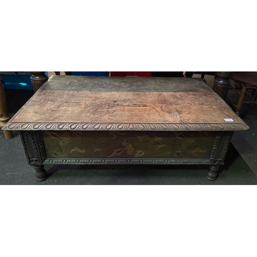 838A - Antique wooden low table with detailed side panels. Approx H39cm x W113cm x D72cm